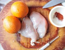 Chicken breasts baked with oranges in the oven